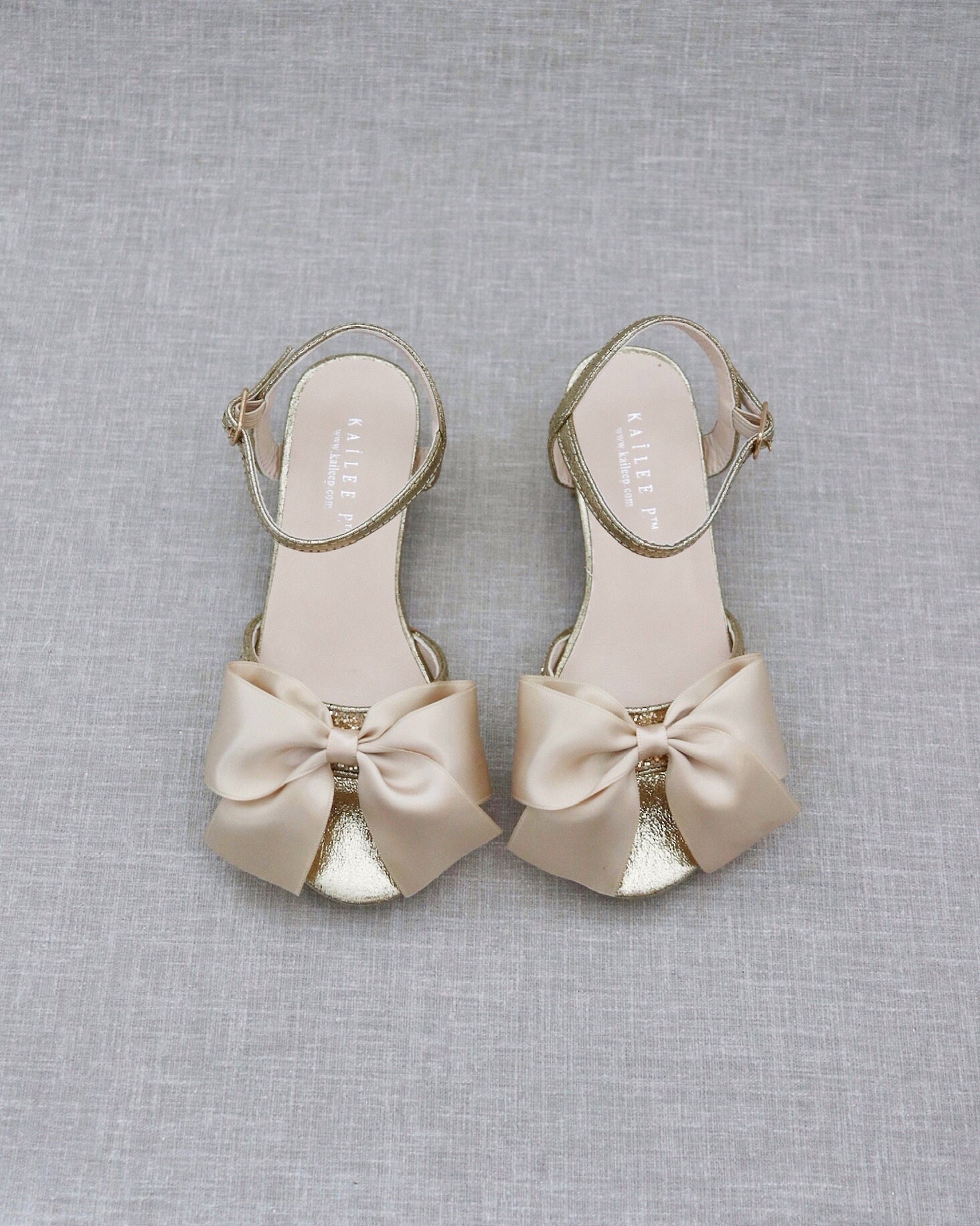 gold bow block heel