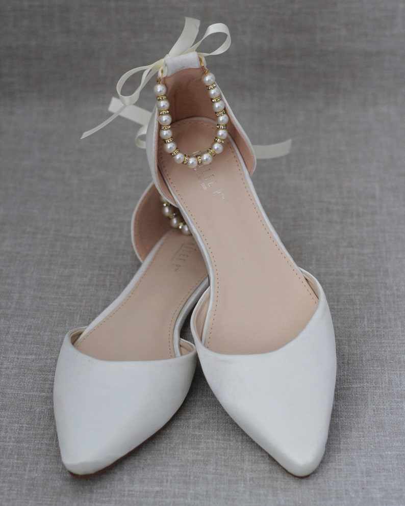 black flats with pearls
