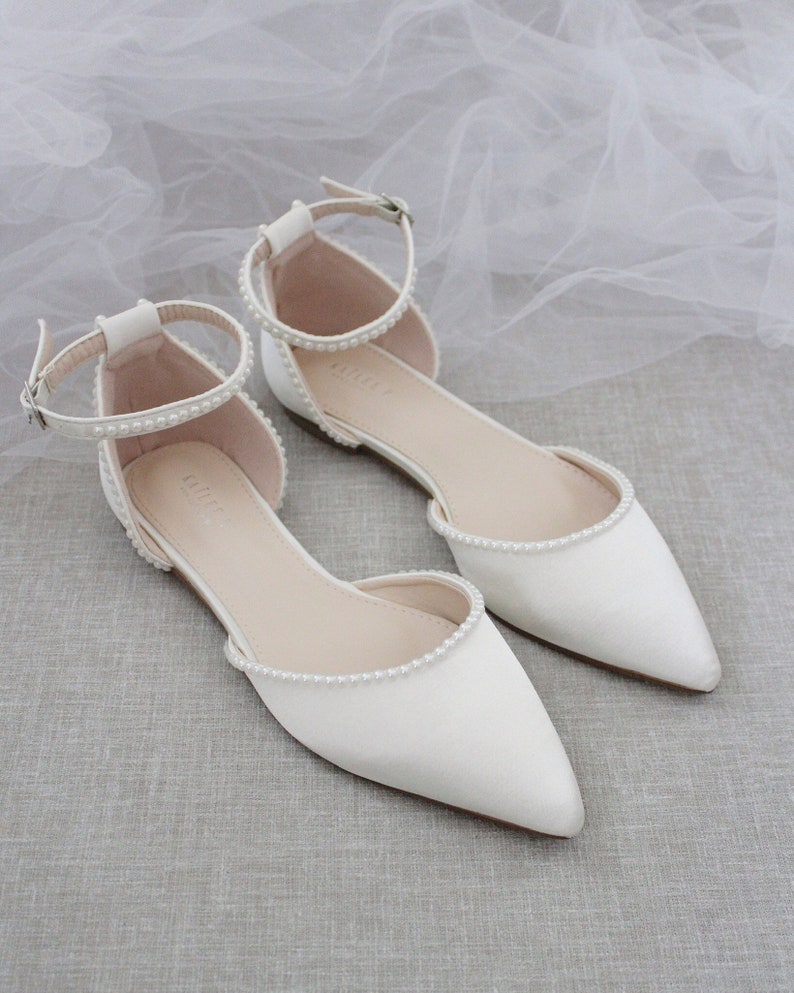 ivory pointed toe flats