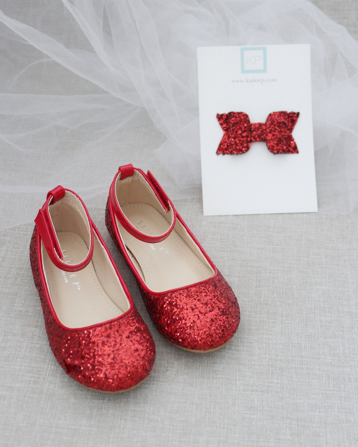 red sparkly ballet flats