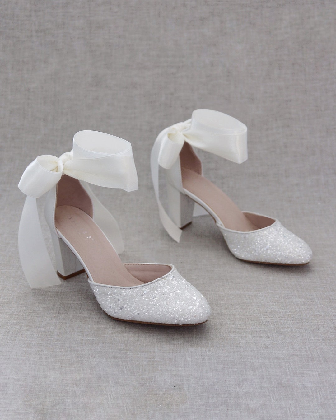 White court shoes with ankle strap top