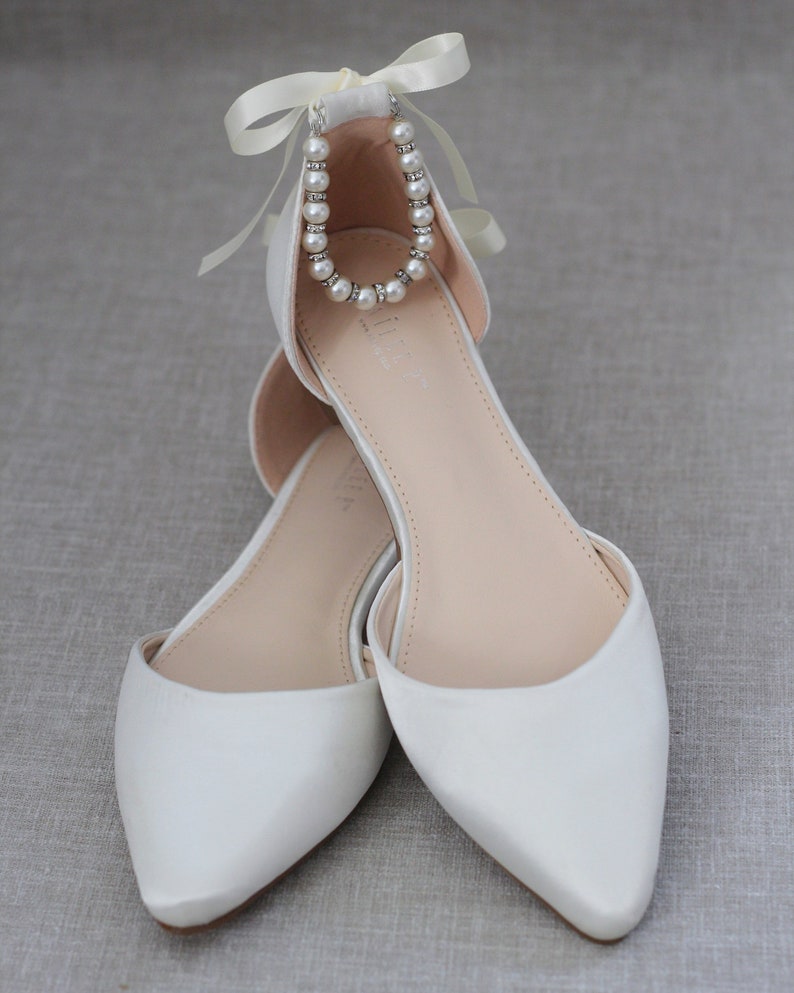ivory pointed flats
