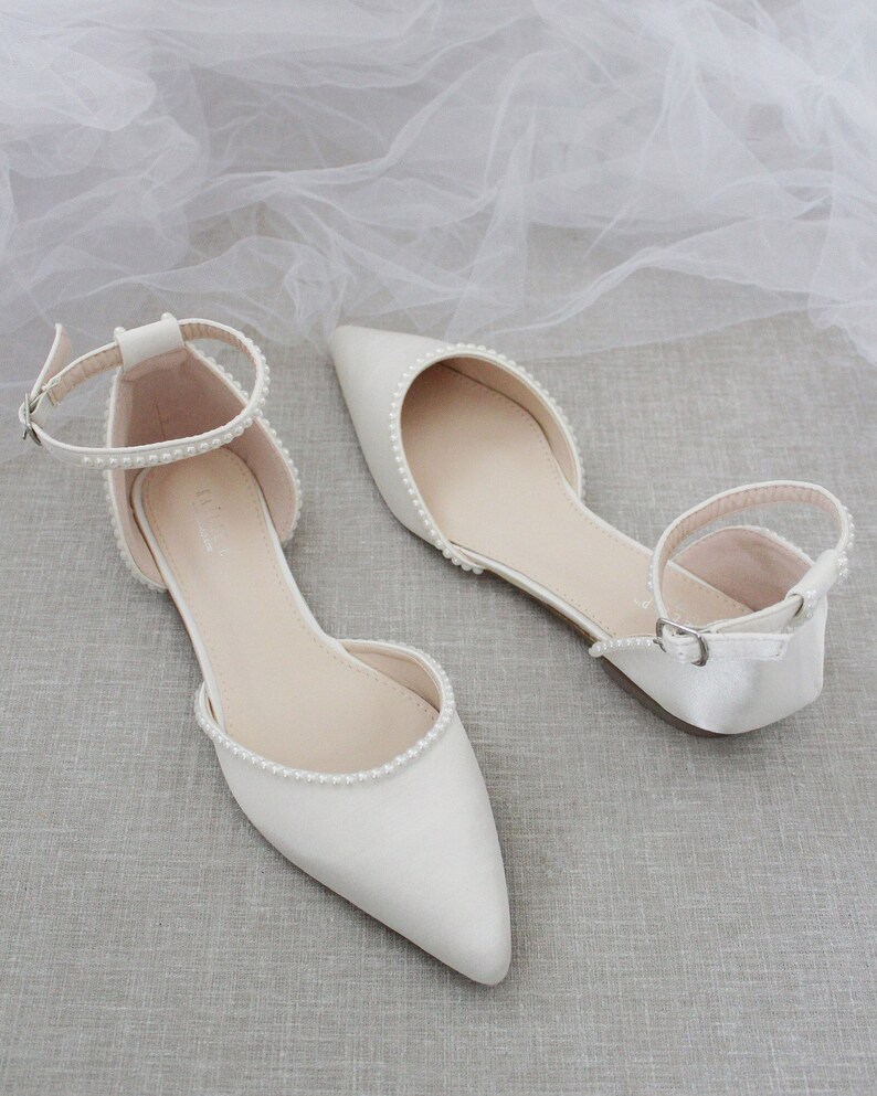ivory pointed toe flats