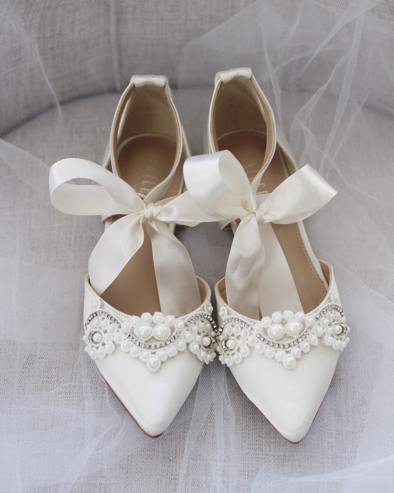 ivory pointed flats