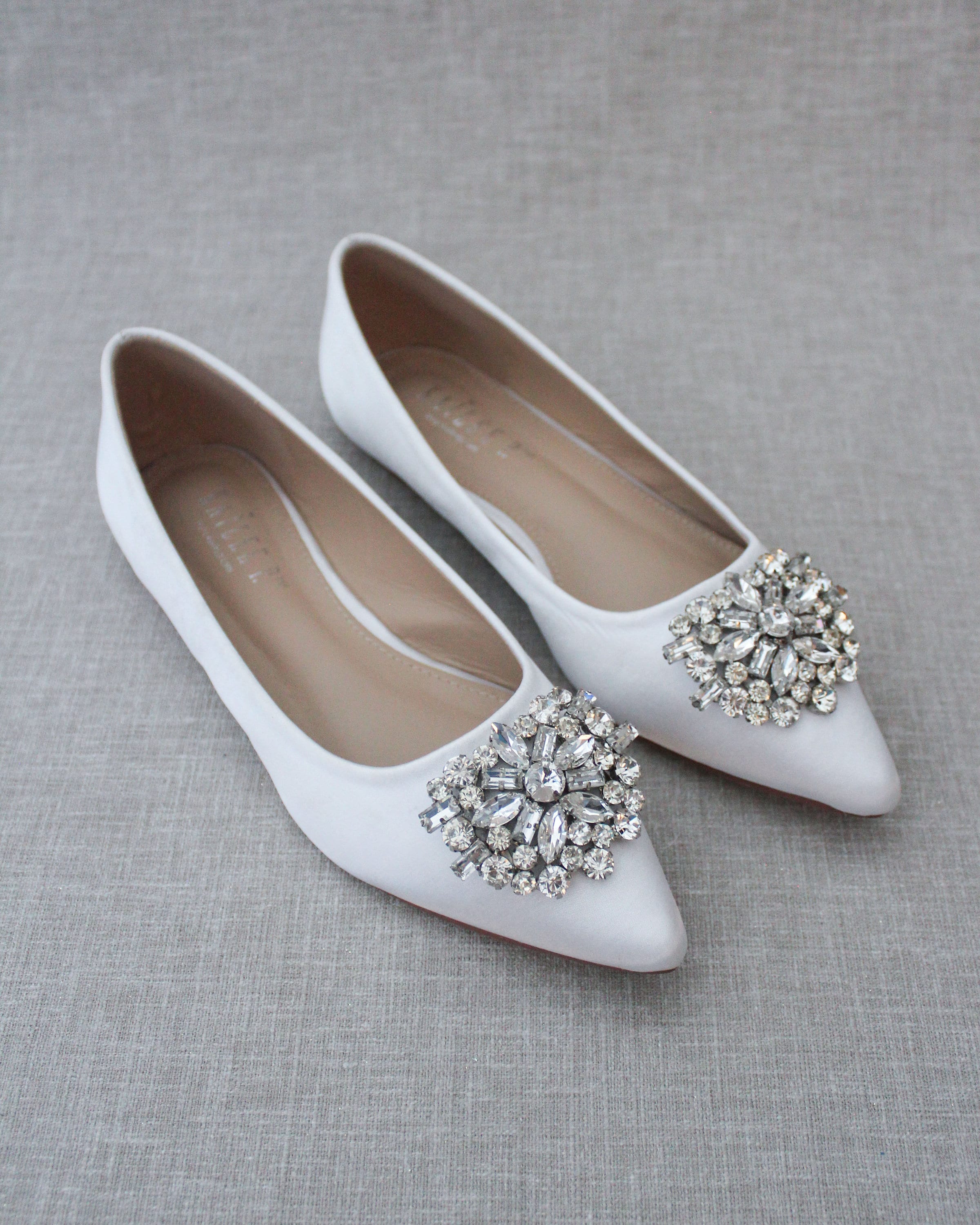 white pointed flat shoes