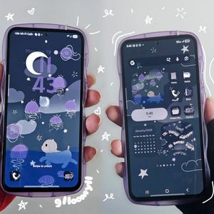May include: Two smartphones in translucent purple wavy-edged cases. The left screen displays a lock screen with a crescent moon, purple jellyfish, and a blue dog illustration. The right screen shows a home screen with app icons and widgets.