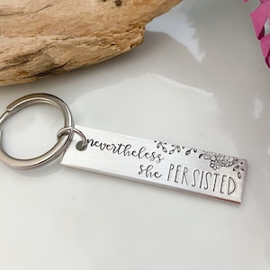 nevertheless, she persisted jewelrykeychainhandstampedsilvercustomizablebirthday giftfriend giftchristmas giftgift for her image 1