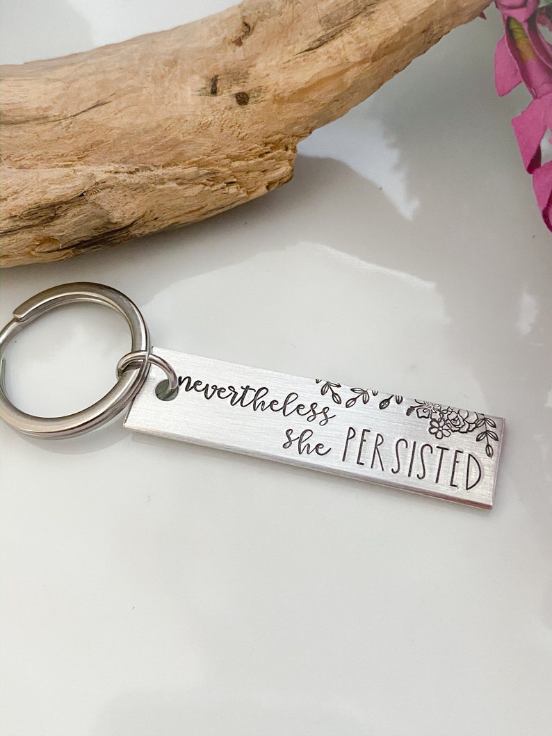 nevertheless, she persisted jewelrykeychainhandstampedsilvercustomizablebirthday giftfriend giftchristmas giftgift for her image 1