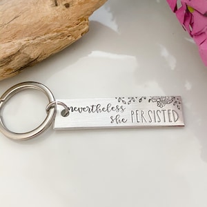 nevertheless, she persisted jewelrykeychainhandstampedsilvercustomizablebirthday giftfriend giftchristmas giftgift for her image 3