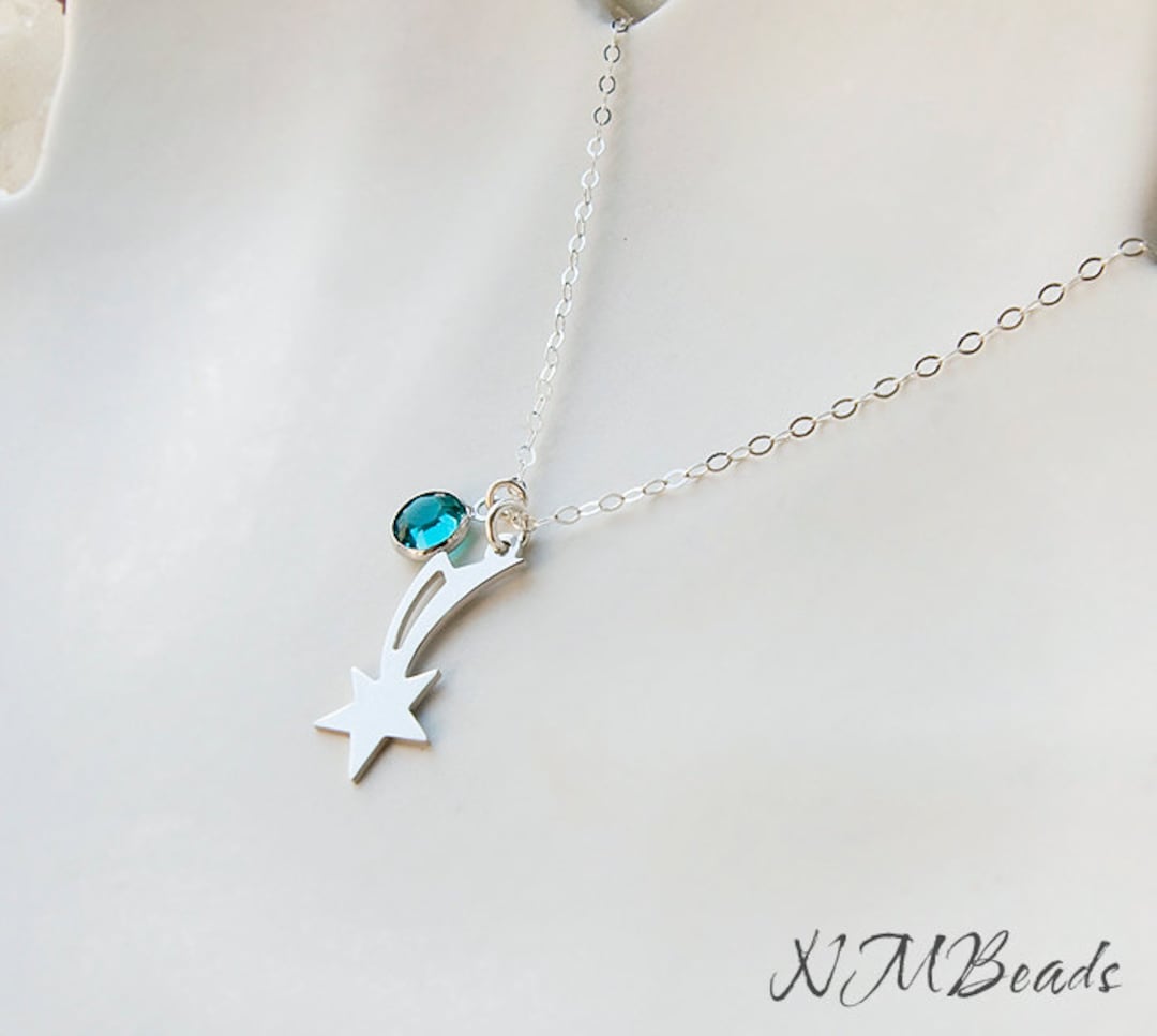 Shooting star necklace best sale swarovski