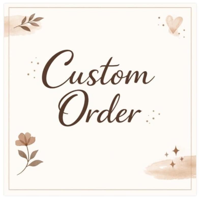 May include: A square sign with a cream background and a thin brown border. The text "Custom Order" is written in a dark brown cursive font in the center. The design features brown watercolor accents, a small heart, a flower, and star icons.