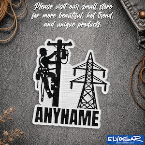 May include: A black and white embroidered patch featuring a silhouette of a utility worker climbing a power pole next to a transmission tower. The word ANYNAME is printed in bold black capital letters at the bottom of the patch design.