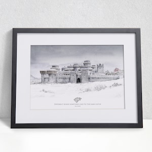 May include: A framed print of a watercolor painting depicting a grey stone castle in a snowy landscape. The castle has multiple towers and a large gate. The text below the image reads "Different roads sometimes lead to the same castle."