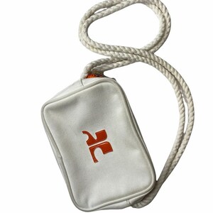 May include: A white canvas crossbody bag with a rope strap and an orange logo.