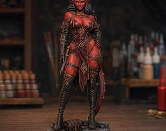 May include: A detailed fantasy figurine of a red-skinned demon character with dark horns, pointed ears, and long black hair. The figure wears dark leather armour, a corset, and tall boots, holding a small dagger while standing on a stone base.