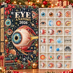 May include: An Eye Anatomy 2026 advent calendar box with a large central eye illustration and numbered doors, paired with a white grid tray containing twenty-four individual eye-themed charms, including eyeballs, glasses, eye drops, and brain diagrams.