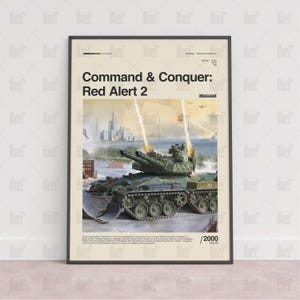 May include: A vertical poster featuring the title Command & Conquer: Red Alert 2 in black text. The central illustration depicts a green military tank with dual cannons firing into the sky, set against a cityscape background. The year 2000 is printed.