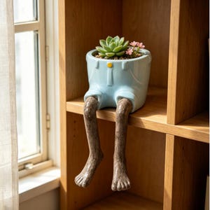 Grappige mini keramische succulentenpot in de vorm van mensenbenen, zittend in een rokje of korte broek, klein plantenpotje, leuk bureaudecoratiecadeau