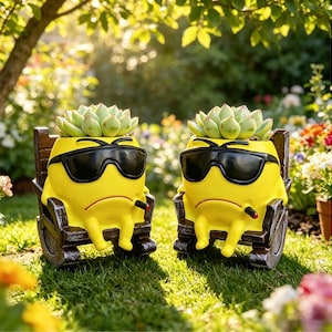 May include: Two yellow, round planters shaped like characters wearing black sunglasses and sitting in dark brown rocking chairs. Each planter features a small, thin, dark protrusion resembling a cigarette and holds a green succulent plant.