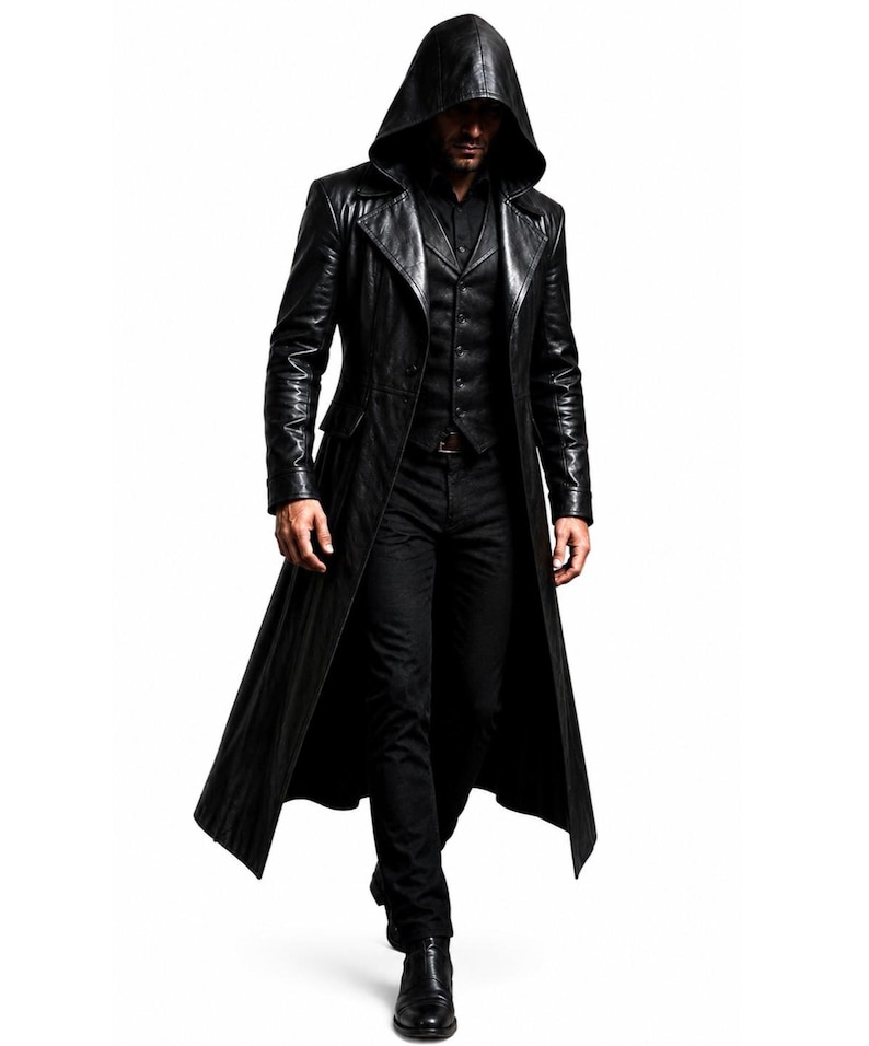 May include: A long black leather trench coat featuring a pointed hood, wide lapels, and long sleeves. The coat is worn over a black button-down shirt, a black vest, black trousers, and black leather boots, creating a monochromatic dark ensemble.