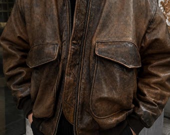 Vintage Distressed Brown Leather Bomber Jacket – Classic Aviator Style, Heavy-Duty Men’s Leather Winter Jacket with Pockets and Ribbed Cuffs