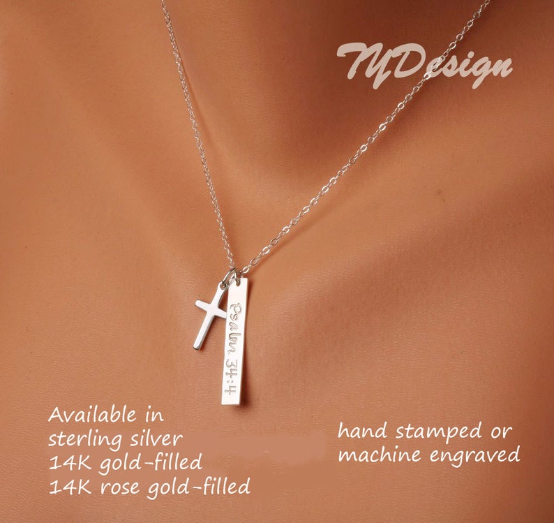 May include: Silver necklace with a cross charm and a rectangular pendant with the inscription "Psalm 34:4". The necklace is available in sterling silver, 14k gold-filled, and 14k rose gold-filled. The pendant can be hand-stamped or machine engraved.