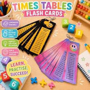 May include: Two sets of times tables flash cards on metal keyrings. One set features black cards with yellow text and a yellow emoji, while the other set has pink and purple gradient cards with black text and a smiley face emoji.