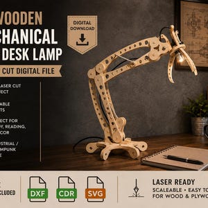 May include: A 3D wooden mechanical arm desk lamp digital download laser cut file. The lamp features a light-coloured wood construction with movable joints, a base, and a small light bulb. Text includes 3D WOODEN MECHANICAL ARM DESK LAMP.