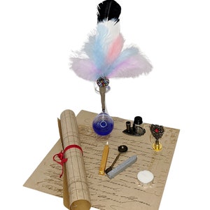May include: A calligraphy set with a blue ink bottle, a feather pen, a wax seal, a candle, a spoon, and a roll of parchment paper.