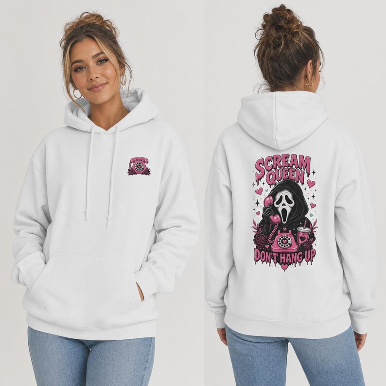 May include: A white hooded sweatshirt featuring a small pink rotary phone graphic on the front left chest. The back displays a large graphic of a hooded figure holding a pink rotary phone with the text "SCREAM QUEEN DON'T HANG UP" in pink.