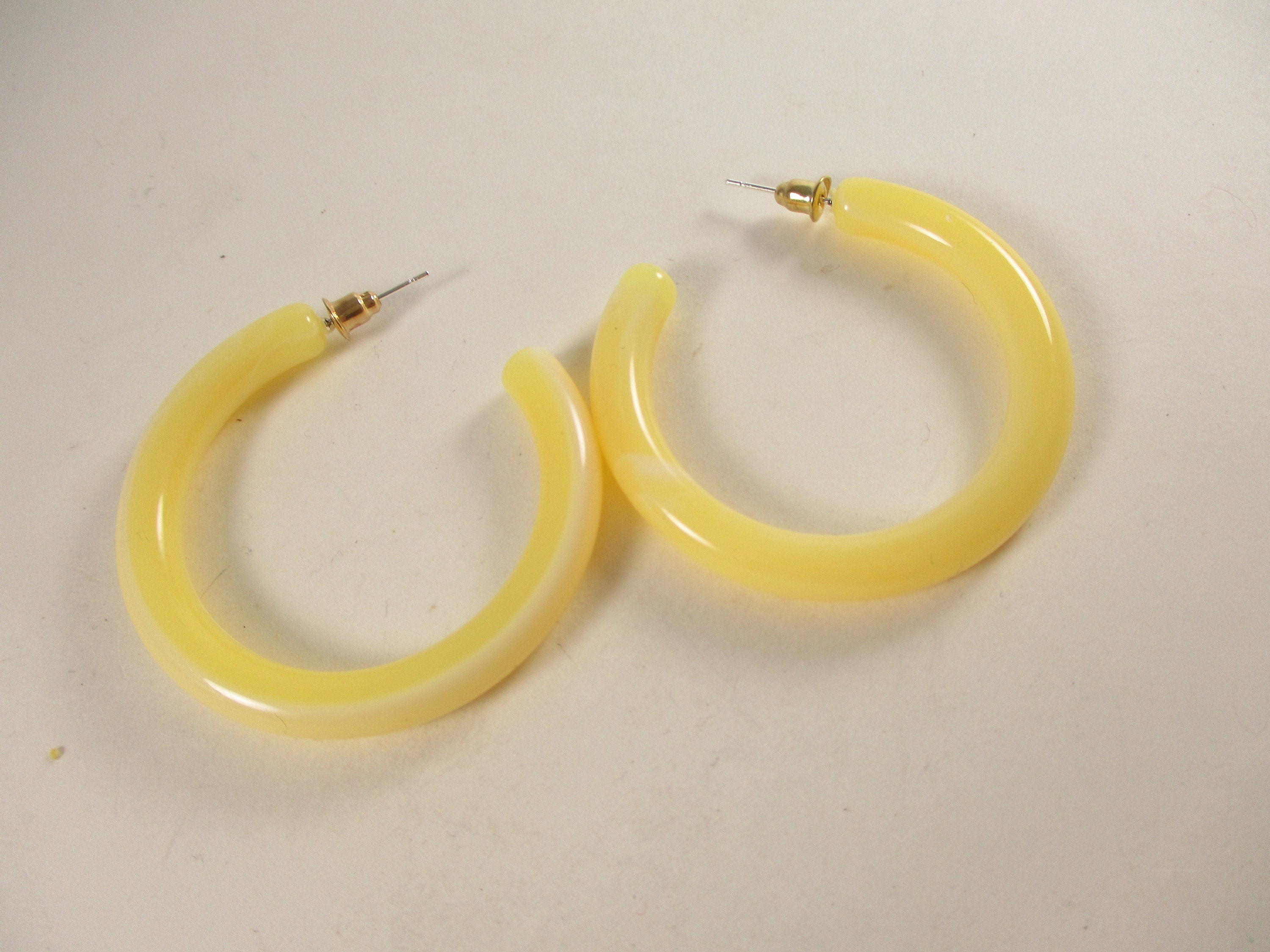 Yellow plastic hoop earrings clearance