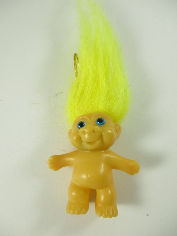 yellow troll doll