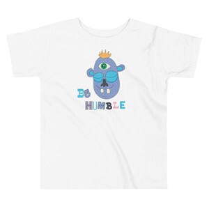 Kids Graphic Tee – BE HUMBLE Magu Shirt | Third-Eye Monster Character | Conscious Kids Clothing for the Whole Family | Toddler & Youth Gift