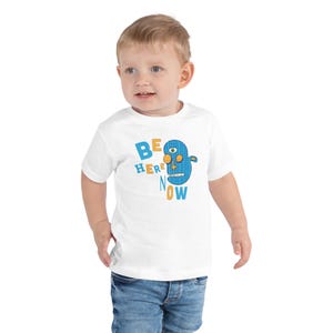 Kids Graphic Tee – BE HERE NOW Magu Shirt | Third-Eye Monster Character | Mindful Conscious Kids Clothing for the Family | Toddler & Youth