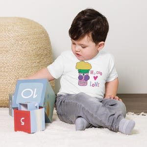 Kids Graphic Tee – MUCHO LOVE Magu Shirt | Third-Eye Monster Character | Conscious Kids Clothing for the Whole Family | Toddler & Youth Gift