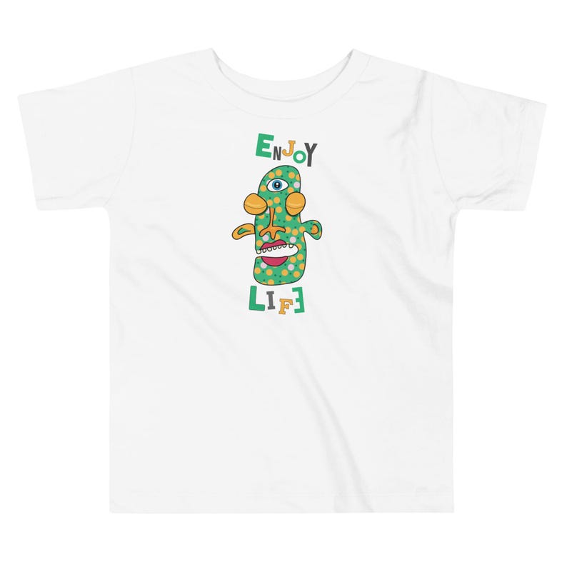 Kids Graphic Tee – ENJOY LIFE Magu Shirt | Third-Eye Monster Character | Joyful Conscious Kids Clothing for the Family | Toddler & Youth