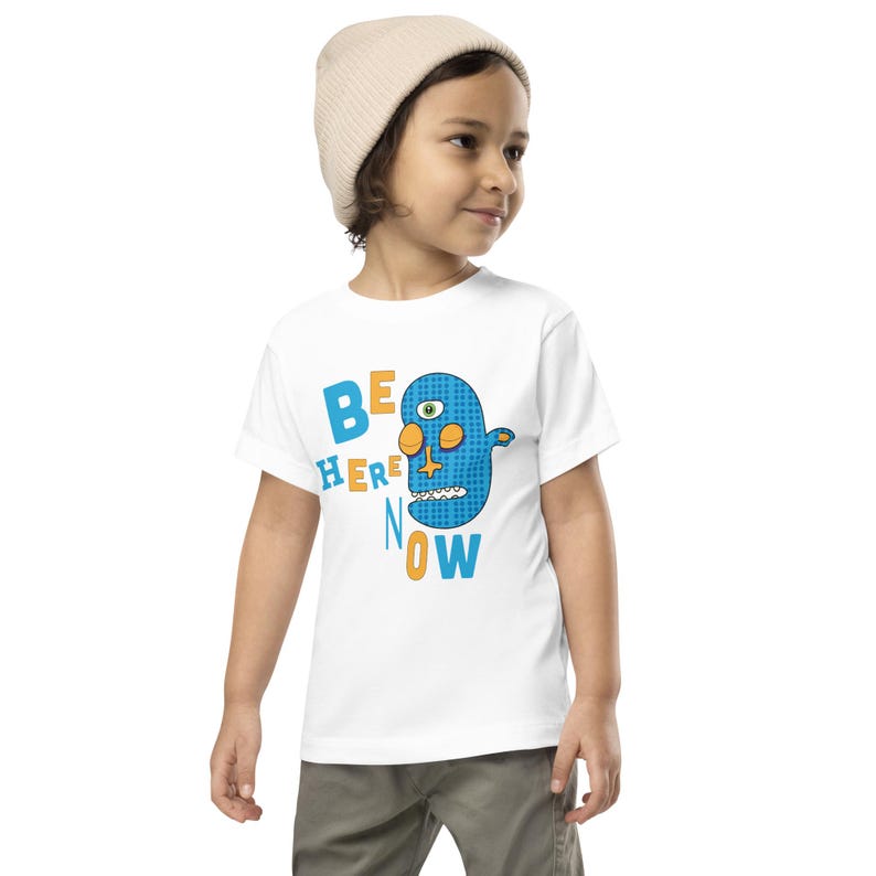 Kids Graphic Tee – BE HERE NOW Magu Shirt | Third-Eye Monster Character | Mindful Conscious Kids Clothing for the Family | Toddler & Youth
