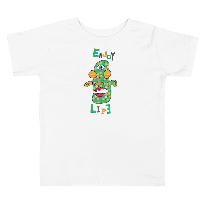 Kids Graphic Tee – ENJOY LIFE Magu Shirt | Third-Eye Monster Character | Joyful Conscious Kids Clothing for the Family | Toddler & Youth