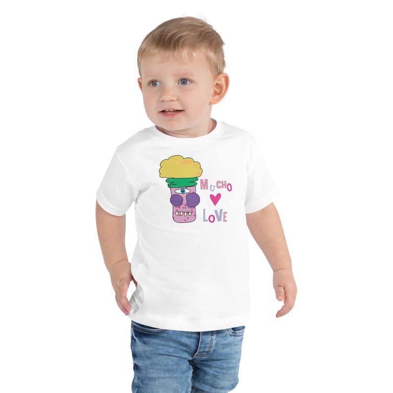 Kids Graphic Tee – MUCHO LOVE Magu Shirt | Third-Eye Monster Character | Conscious Kids Clothing for the Whole Family | Toddler & Youth Gift