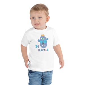 Kids Graphic Tee – BE HUMBLE Magu Shirt | Third-Eye Monster Character | Conscious Kids Clothing for the Whole Family | Toddler & Youth Gift