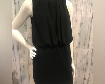 Black blousons LBD with pockets.