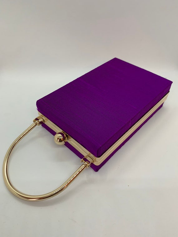 mauve clutch