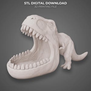 May include: A light beige 3D printed Tyrannosaurus Rex figure with an open mouth, featuring visible layer lines. The text STL DIGITAL DOWNLOAD 3D PRINTING FILE is displayed above the dinosaur figure against a solid gray background.