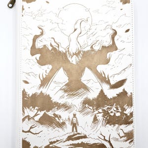 May include: A white zipped portfolio case featuring a brown ink-style illustration of a small figure standing before a large, ethereal, flame-like creature in a mountainous landscape under a full moon, with detailed forest and sky elements.
