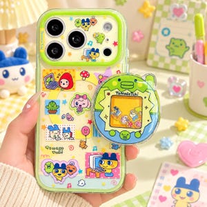iPhoneアクセサリー Tamagotchi Egg Phone Case - MAMETCHI Tamagotchi Phone Case With Grip - Etsy