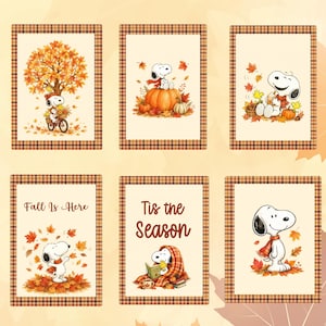 May include: Six rectangular cards with a brown plaid border featuring Snoopy and Woodstock in autumn scenes. Illustrations include Snoopy on a bicycle, sitting on pumpkins, reading under a blanket, and surrounded by falling leaves with text "Fall Is Here" and "Tis the Season".