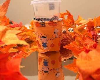 Funda para café Peanuts con diseño de calabaza, funda de algodón otoñal para bebidas (16-24 oz)