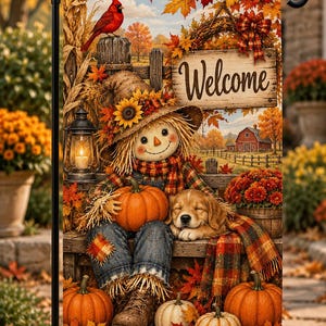May include: A rectangular garden flag featuring a scarecrow wearing a sunflower hat, sitting on a bench with a golden puppy and a pumpkin. The scene includes a red cardinal, a lantern, autumn leaves, and a wooden sign with the text Welcome.