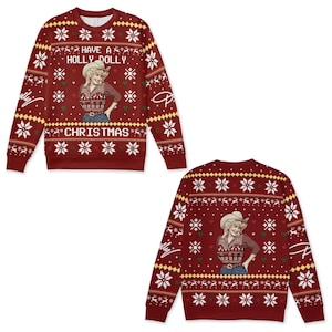 May include: A dark red long-sleeve crewneck sweatshirt featuring a repeating white and yellow holiday pattern of snowflakes and reindeer. The front displays a graphic of a person in a cowboy hat with the text HAVE A HOLLY DOLLY CHRISTMAS.