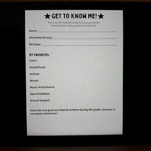May include: A white Get To Know Me questionnaire printed on a screen, featuring fields for name, nickname, birthday, and favorites including color, snack, animal, movie, music, sport, and school subject, plus a goal prompt for 6th grade students.